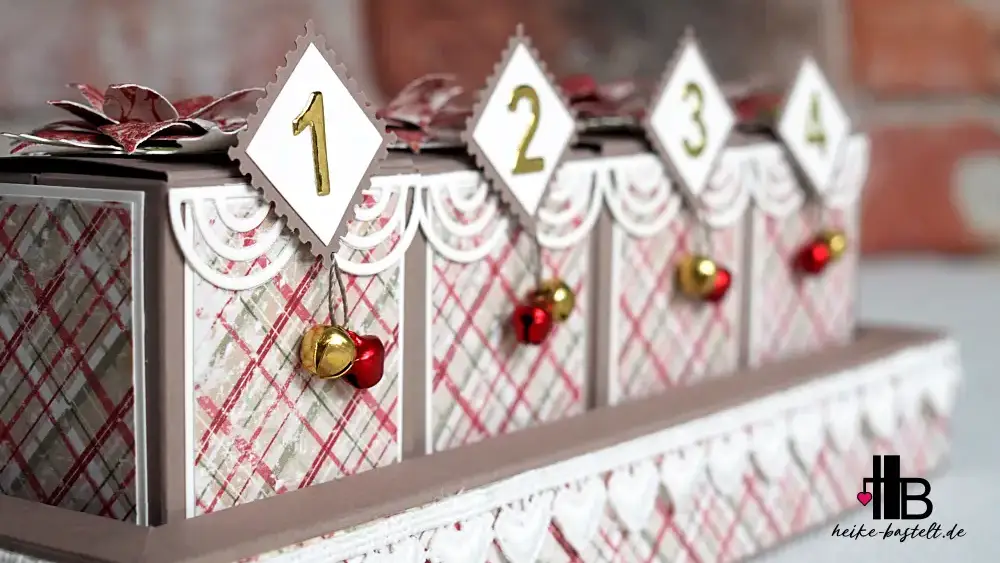 DIY Adventskalender mit 4 Türchen als Schachteln in einer Box.