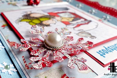 Gestanzte Schneeflocke mit Brad in der Mitte. Der Stanzer ist von Martha Stewart und heißt Arctic Snowflake.